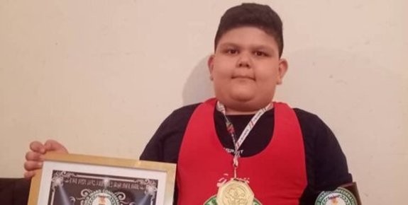 شکستن رکورد رضازاده توسط قویترین کودک دنیا شکستن رکورد رضازاده توسط قویترین کودک دنیا